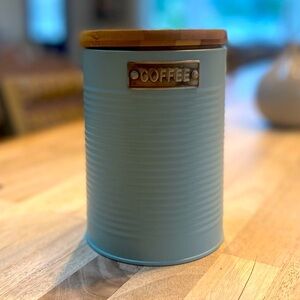 Tin coffee canister.